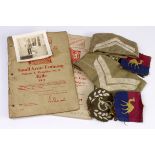 WW2 selection of RASC cloth & metal badges, trade badges, small arms booklets on the rifle and