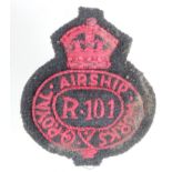 Badge a Royal Airship Works R101 cloth cap badge.