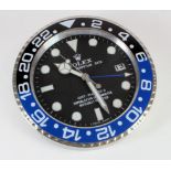 Advertising Wall Clock. Blue, black & chrome 'Rolex' advertising wall clock, black dial reads 'Rolex