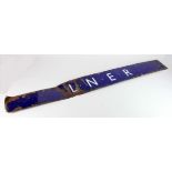 Advertising. A blue & white enamel sign 'L.N.E.R' (London North Eastern Railway), worn, 136cm x 14.