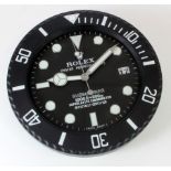 Advertising Wall Clock. Black 'Rolex' advertising wall clock, black dial reads 'Rolex Oyster