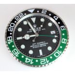 Advertising Wall Clock. Black, green & chrome 'Rolex' advertising wall clock, black dial reads '