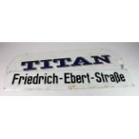 Advertising. Two enamel signs, comprising 'Titan' (blue & white), 87cm x 27cm approx., & '