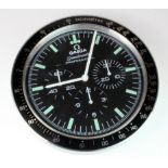 Advertising Wall Clock. Black & chrome 'Omega' advertising wall clock, black dial reads 'Omega