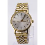 Gents gold plated Omega wristwatch circa 1970s The silver dial with gilt baton markers, date