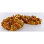 Attractive butterscotch amber graduated chunk necklace with silver bolt ring clasp, length 51cm,