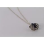 Platinum sapphire and diamond cluster pendant on silver chain, length 45cm, weight 2.5g