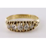 Beautiful 18ct yellow gold boat shaped ring set with five graduated old cut diamonds, total