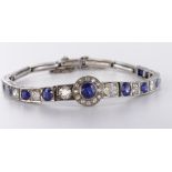 Tests as approx. 18ct white gold sapphire and diamond linked bracelet. This impressive bracelet