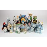 Wade. A collection of twenty-one Wade figurines, including two blow up Scamp dogs, Paddington no. 3,