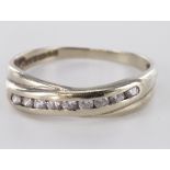 9ct yellow gold channel set diamond half eternity ring, finger size P, weight 2.2g