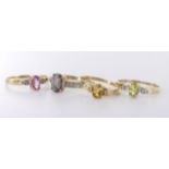 Four 9ct yellow gold gemstone and diamond set rings, weight 4.5g