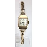 Ladies 9ct cased Benson wristwatch, hallmarked 1950 on a 9ct bracelet. Total weight 13.7g. Working