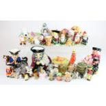 Ceramics. A collection of ceramics, including Toby Jugs, figurines (incl. Snow White & the Seven