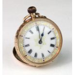 Ladies 14ct cased fob watch, Approx 30mm dia. Not working when catalogued