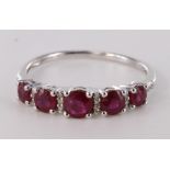 9ct white gold ruby and diamond half eternity ring consisting of five round graduated rubies divided