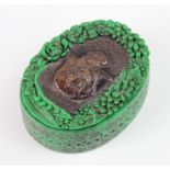 Green malachite jewellery box with plaque to lid depicting a woman holding a bird, height 25mm,