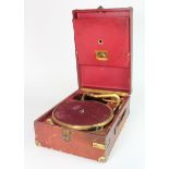 His Masters Voice red leather portable gramophone, height 15cm, width 29cm, depth 42cm approx. (