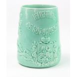 Russian interest. A commemorative green ceramic beaker with embossed decoration, by Kuznetsov,