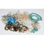Necklaces & Bracelets. A collection of twelve necklaces & bracelets, including pearls, mostly with