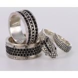 Three silver rings by designer Thomas Sabo, all set with black cz stones. Snake ring, finger size Q,