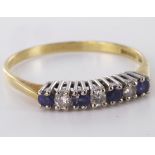 18ct yellow gold sapphire and diamond half eternity ring set with four sapphires and three diamonds,