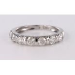 9ct white gold diamond half eternity ring set with seven round brilliant cut diamonds in bar