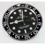 Advertising Wall Clock. Black & chrome 'Rolex' advertising wall clock, black dial reads 'Rolex