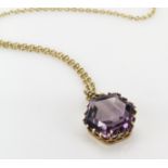 9ct yellow gold hexagon cut amethyst pendant with twist bale, on trace chain, length 53cm, weight