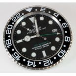 Advertising Wall Clock. Black & chrome 'Rolex' advertising wall clock, black dial reads 'Rolex