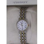 Ladies bi colour Tissot quartz bracelet wristwatch, round white dial with black Roman numerals and