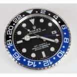 Advertising Wall Clock. Blue, black & chrome 'Rolex' advertising wall clock, black dial reads 'Rolex