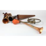 Five brass & copper horns, including a car horn, bugle, etc.