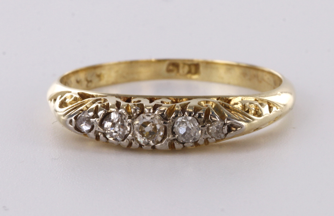 18ct stamped Gold 5 stone Diamond Ring size K weight 2.3g