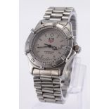 Ladies Tag Heuer professional 200 meters wristwatch with a stainless steel case and bracelet