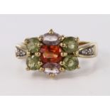 9ct yellow gold topaz and peridot cluster dress ring with diamond accent shoulders, finger size N,