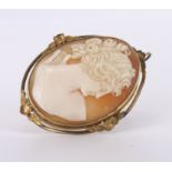 Cameo brooch in a yellow metal surround, stamped 10K, approx 45mm in length