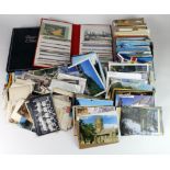 Box containing various loose postcards, all era's, plus a small album inc Essex & Suffolk. (Qty)