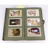 Edwardian postcard album with metal clasp, containing good selection of comic, London and general