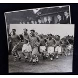 England 1951 (9"x7") b&w photo showing Team & Officials in blazers seated outside hotel prior to the