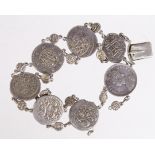 Coin Bracelet, silver/white metal 22mm, set with Indian states silver 'half rupees', minors, and a