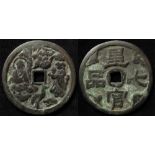 China, bronze 'cash' charm 47mm featuring religious iconography.