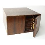 Coin Cabinet: 14-drawer mahogany cabinet, 30cm deep, some scratches to top (missing key)