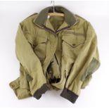 Para smock unusual pattern in plain khaki with elasticised cuffs wag tail with various repairs,