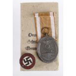 WW2 German Westwall Medal Unissued in original packet & a late war Ersatz N.S.D.A.P Button Hole Pin.