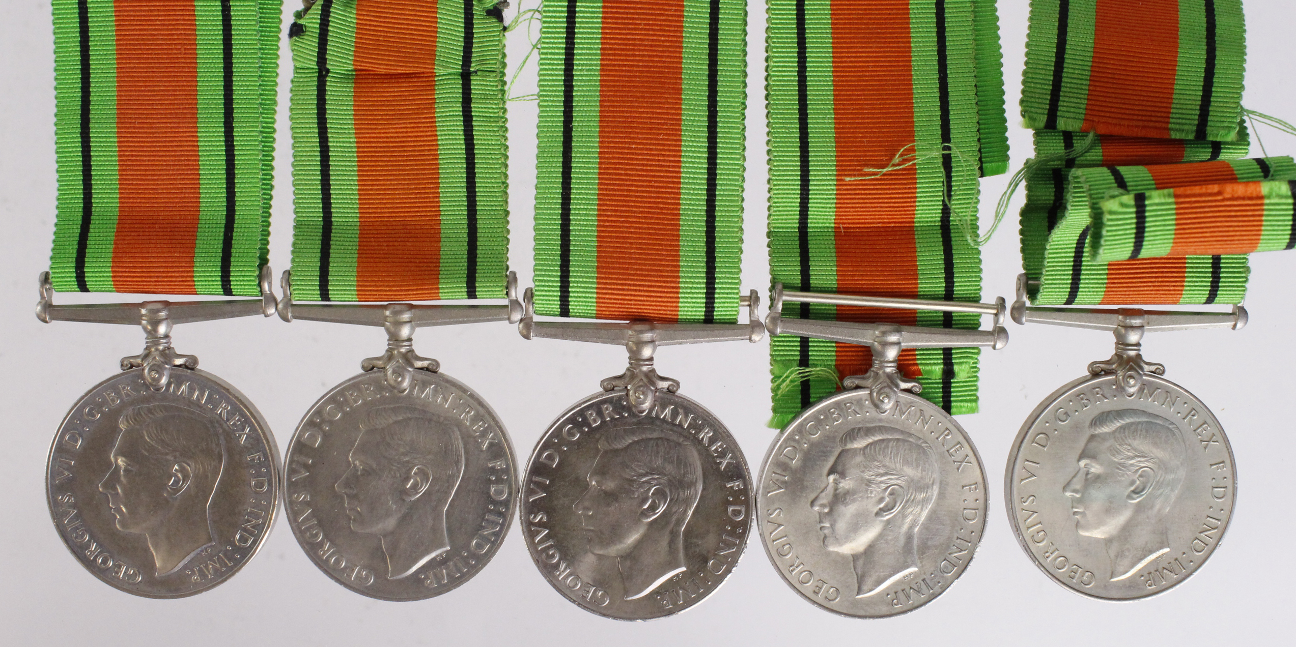 WW2, 5x boxed Defence Medals in separate boxes to various recipients