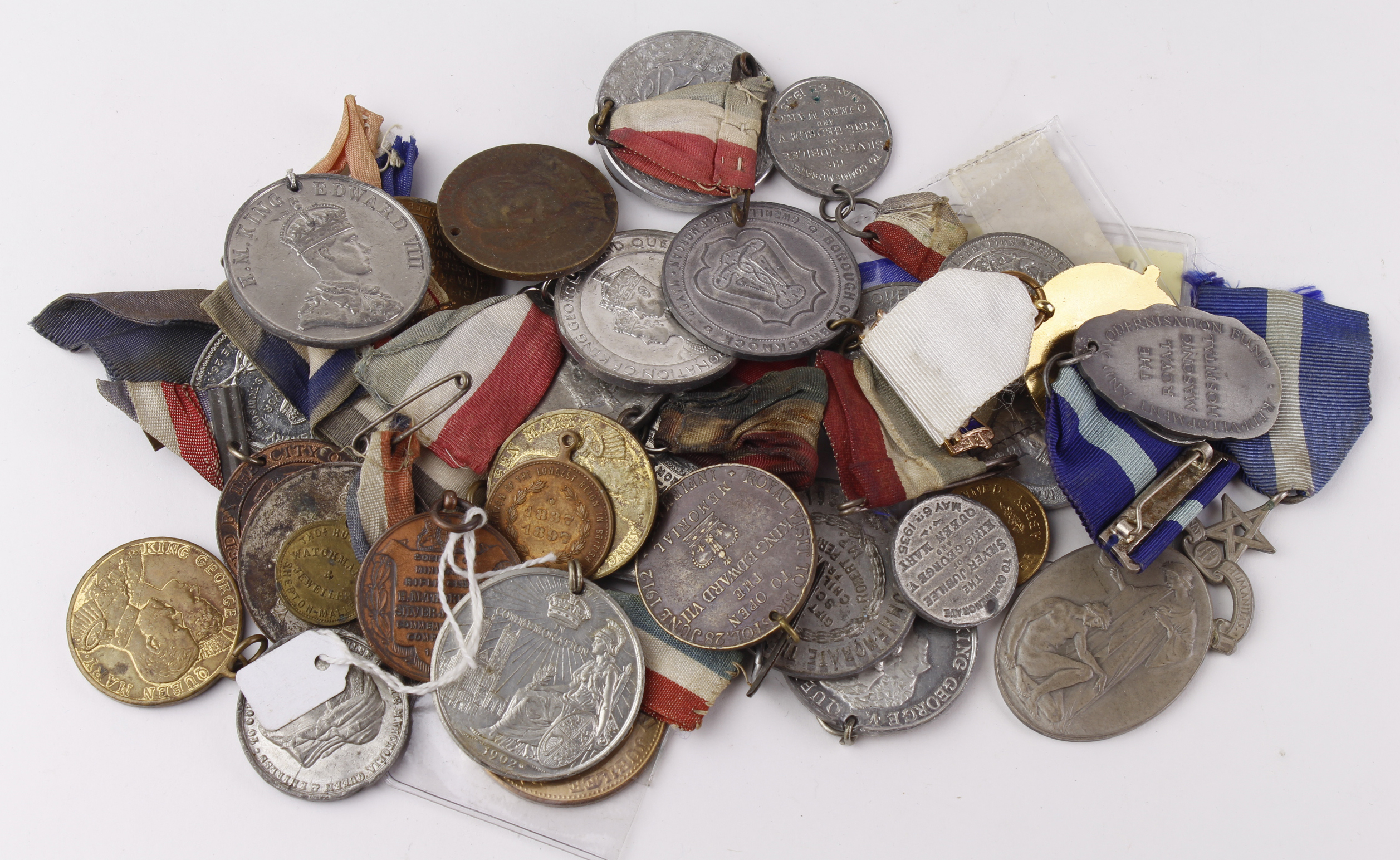 Tub of mixed Coronation medals / medallions, and a few Masonic medals inc silver hallmarked. (Qty)