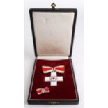 German Red Cross 'Badge of Honour' Medal, numbered '180' to edge. Plus miniature on ribbon. In