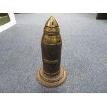 Inert Artillery Shell on turned wooden base for display, brass fuse disassembles, brass plaque on