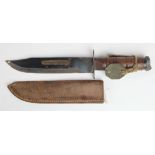 American M1 Fighting knife, in contemporary leather scabbard with dog tag tied to grip (this with